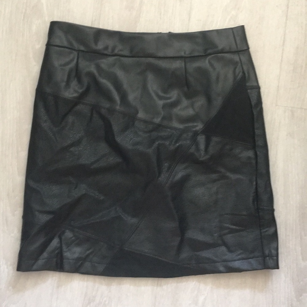 Short black leather skirt